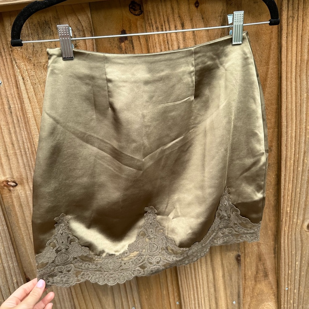 Olive green skirt from urban outfitters with pretty detail on the bottom